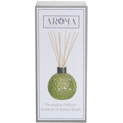 Bottiglia vuota verde con bastoncini diffusori in una scatola di Woodbridge Candle